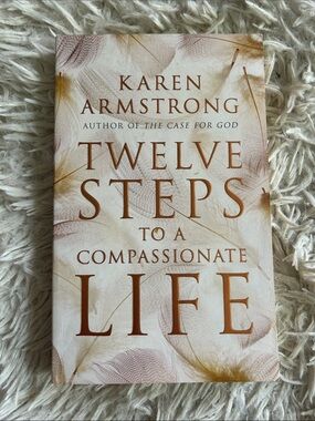 Twelve (12) steps to a compassionate life, by Karen Armstrong, paperback